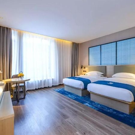 Echarm Hotel Ji'Nan Railway Station Csinan Kültér fotó