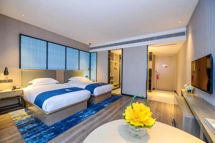 Echarm Hotel Ji'Nan Railway Station Csinan Kültér fotó